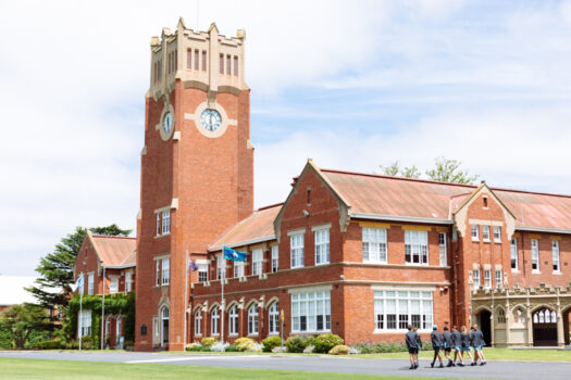 Geelong Grammar School Corio Campus Clock Tower building with students walking.
