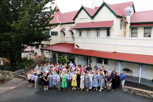 Staff members at Rockhampton Girls Grammar School in front of the iconic and heritage listed Paterson House.